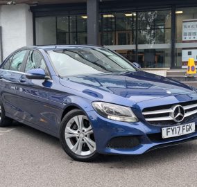 Blue Mercedes-Benz C Class C220d SE saloon parked outside, front three-quarter view - 313 Motors, Oldham