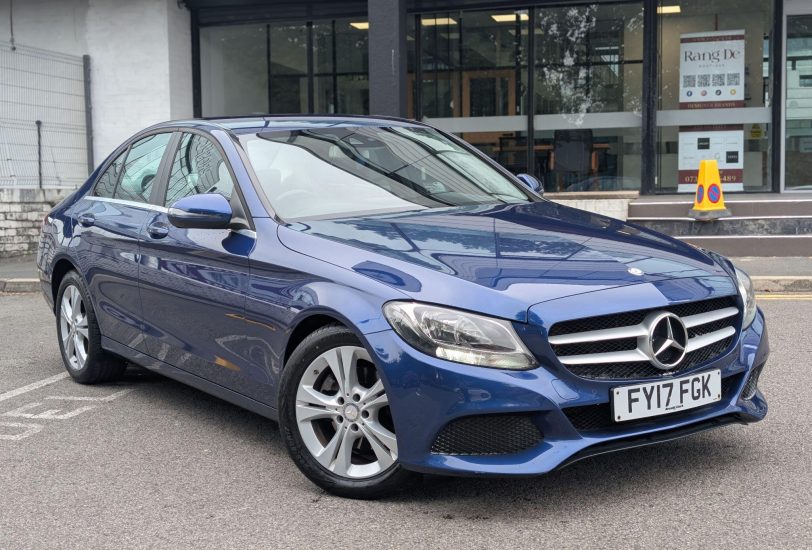 Blue Mercedes-Benz C Class C220d SE saloon parked outside, front three-quarter view - 313 Motors, Oldham
