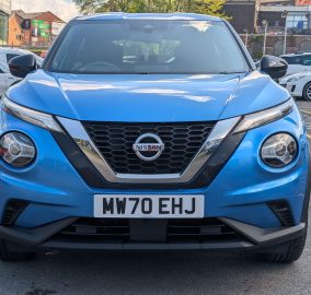 Blue Nissan Juke 1.0 DIG-T Acenta SUV, front view showing grille and headlights - 313 Motors, Oldham