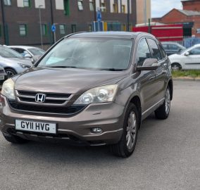 Bronze Honda CR-V 2.2 i-DTEC EX 4WD SUV showing alloy wheels, front three-quarter view - 313 Motors, Oldham